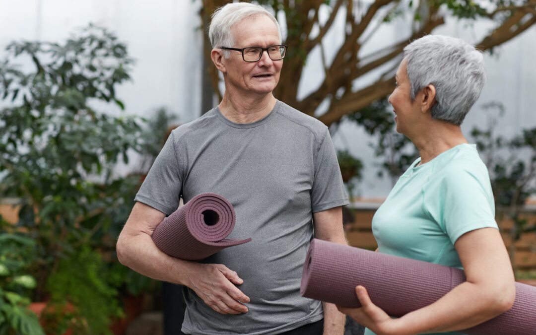 senior couple talking about yoga mats